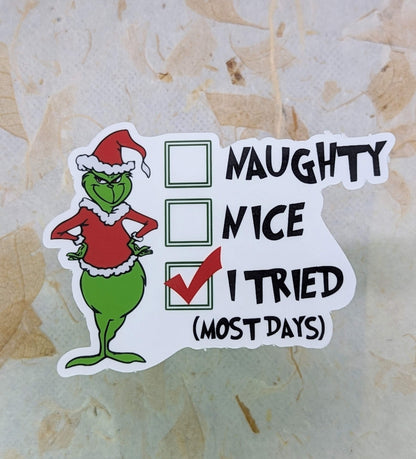 Sticker of the Grinch with checkboxes and text on a textured beige background