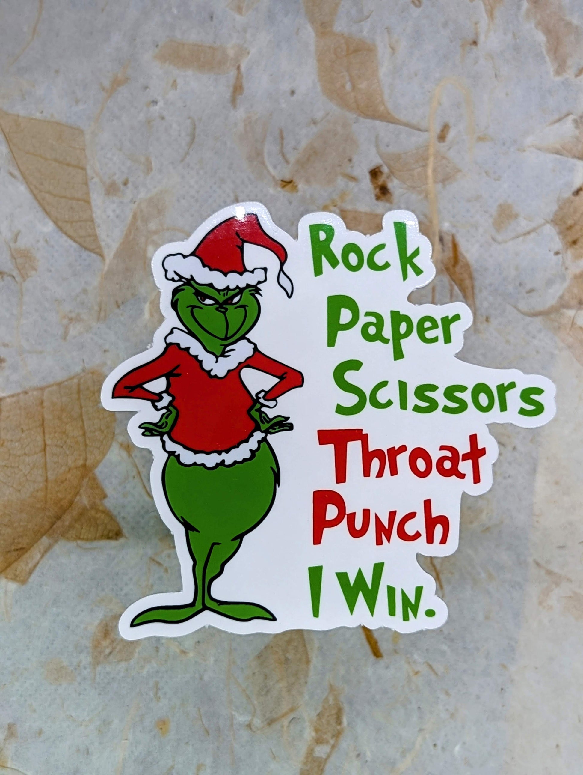 Sticker with  Grinch in a Santa hat  