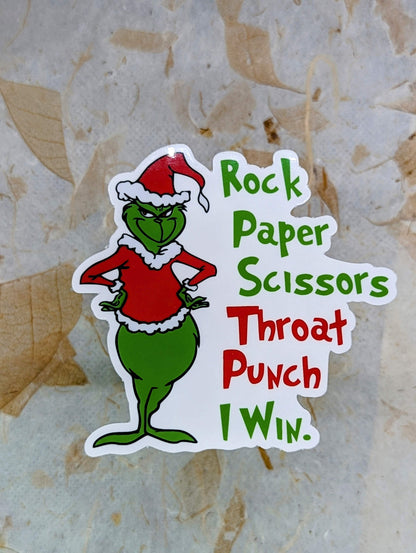 Sticker with  Grinch in a Santa hat  