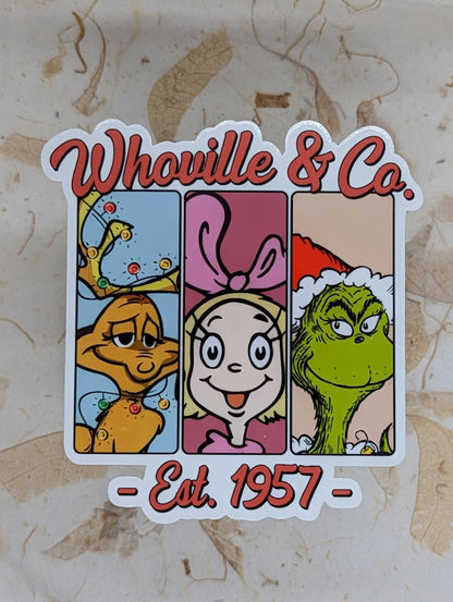 Sticker with cartoon characters and 'Whoville & Co. Est. 1957'  
