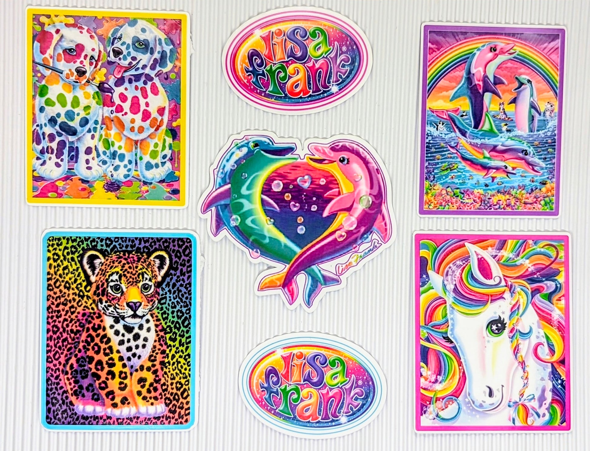 Colorful stickers featuring animals and Lisa Frank 