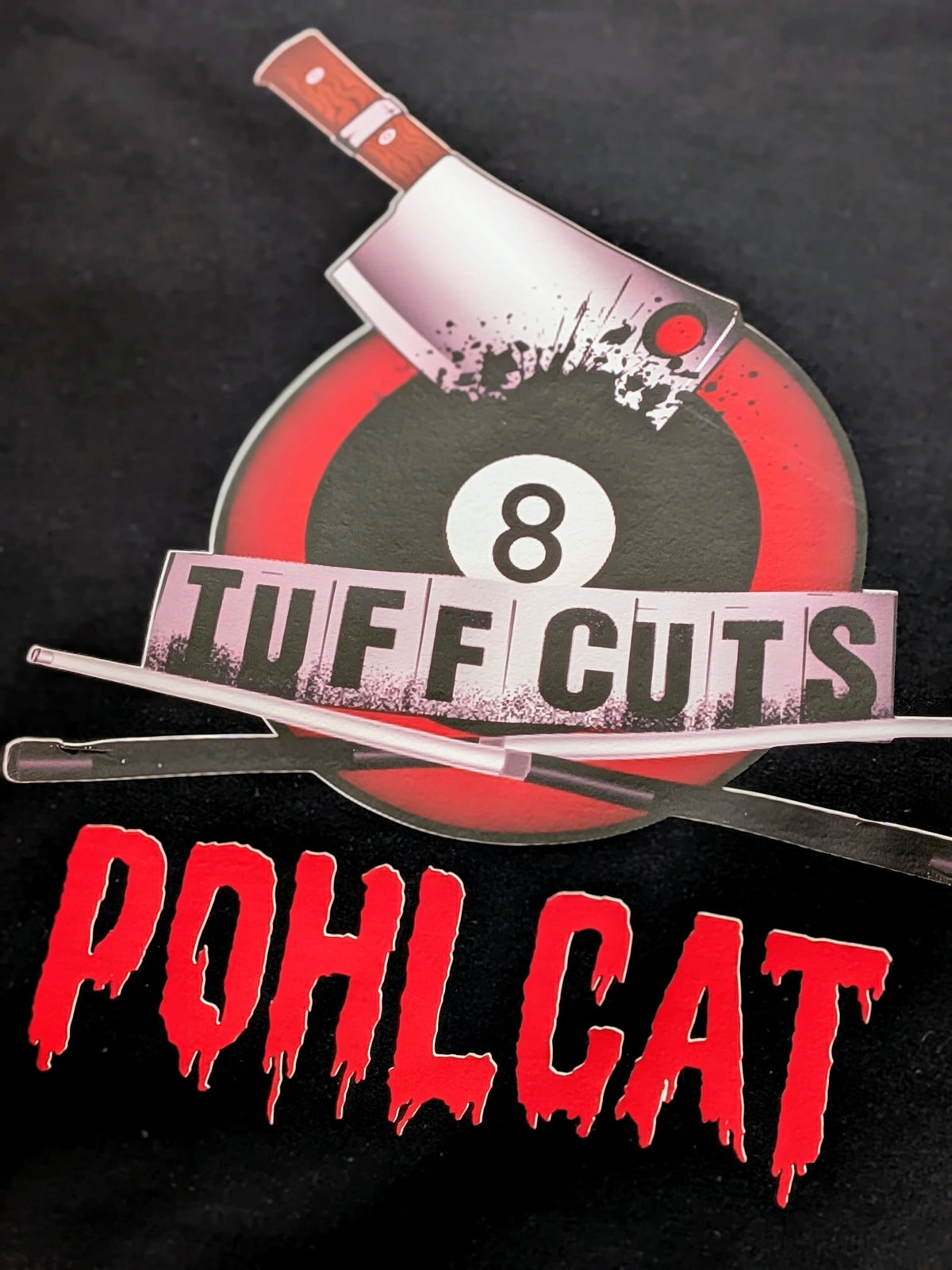 Custom iron-on transfer on dark fabric - bold red and black team logo design ironed onto a black t-shirt