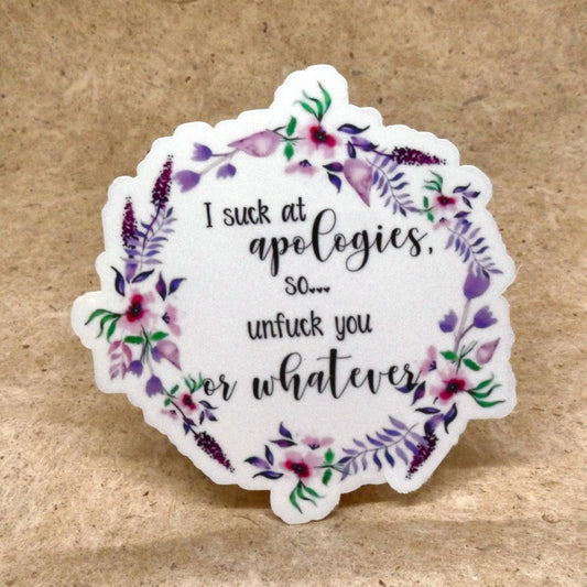 I Suck At Apologies floral wreath die-cut vinyl sticker, real product photo