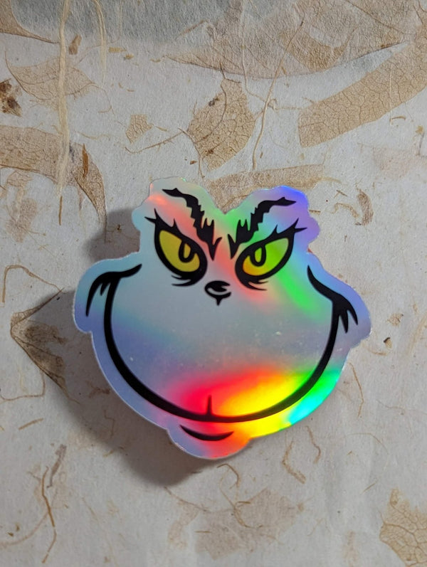 Holographic grumpy Christmas face sticker