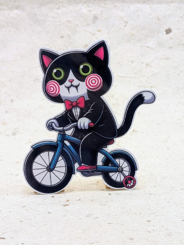 Puppet kitty on a tricycle Halloween sticker
