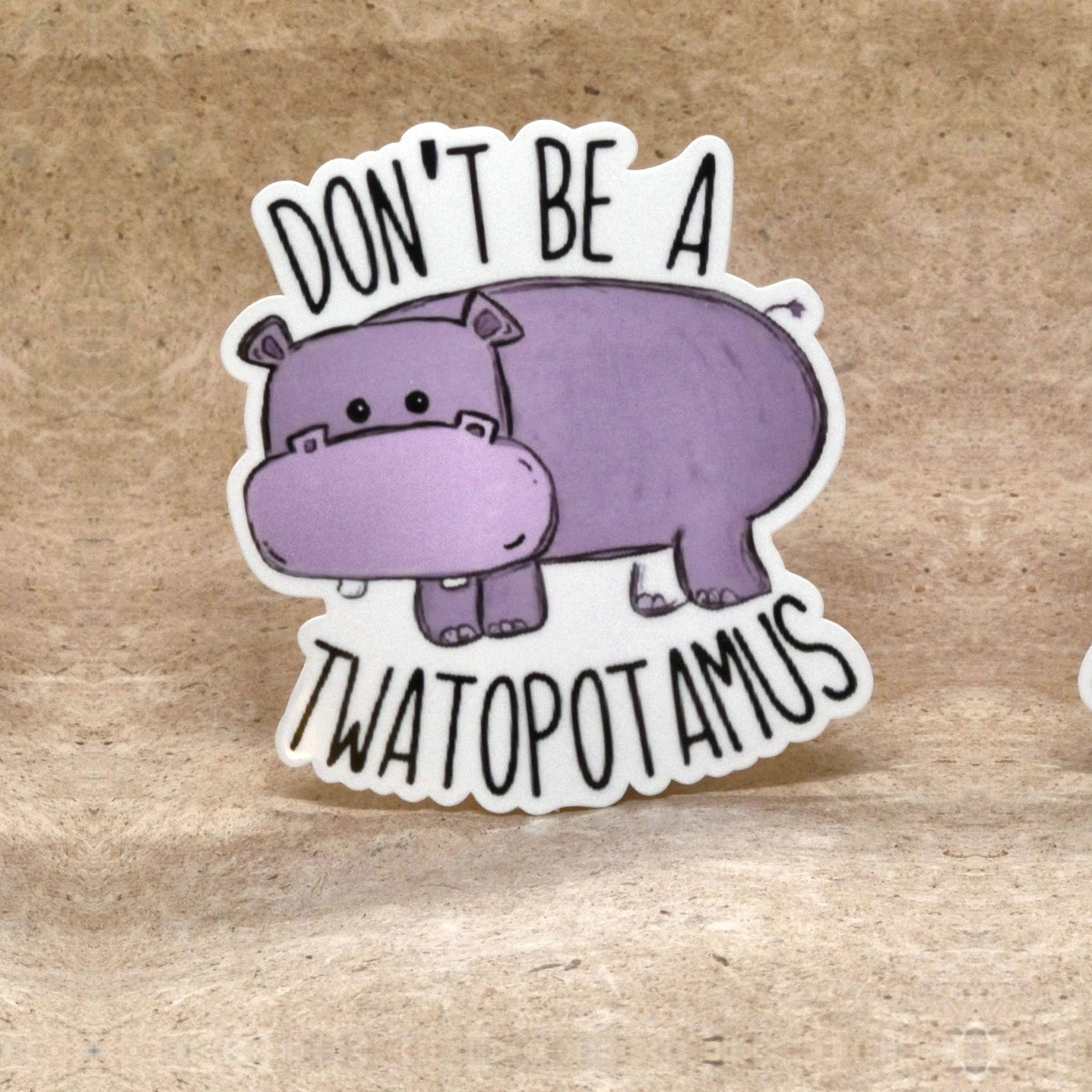 Don't Be A Twatopotamus purple hippo die-cut vinyl sticker, real product photo