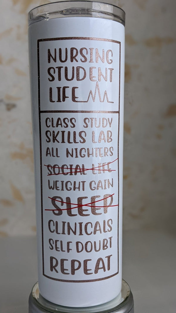 Rose gold glitter Nursing Student Life vinyl decal on a white skinny tumbler