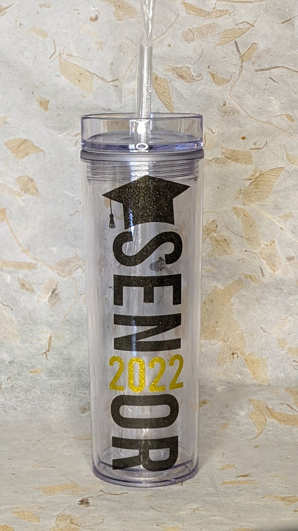 Black and gold glitter Senior class year vinyl decal on a clear tumbler