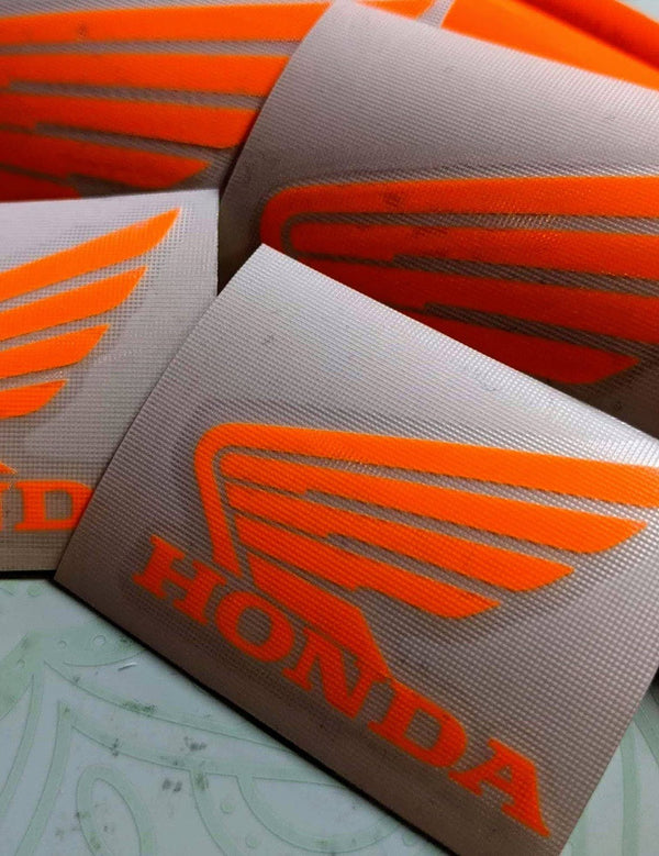 Neon orange motorcycle wing logo vinyl decals, a personal project