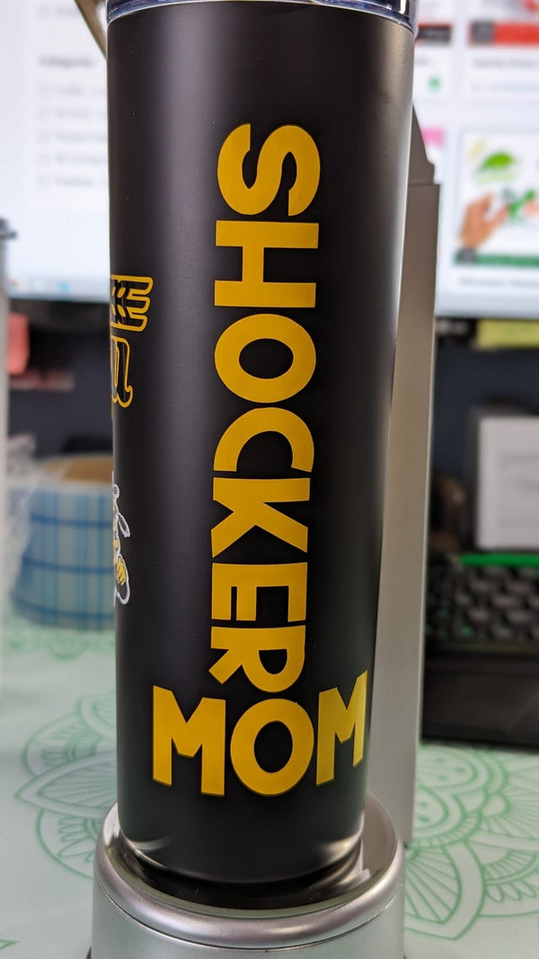 Yellow Shocker Mom vinyl decal on a black skinny tumbler, a personal project