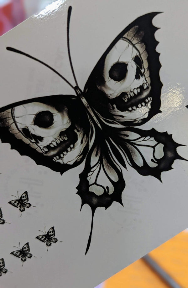 Black and white skull-wing butterfly waterslide decals