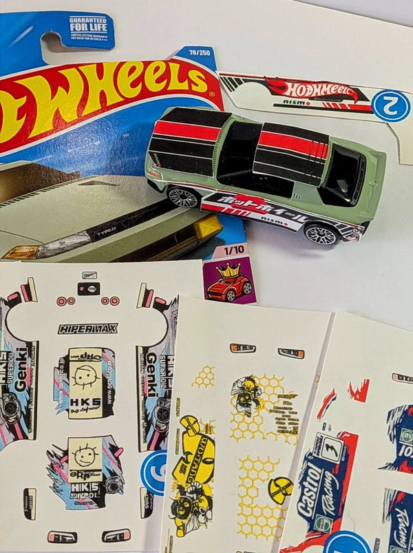 Custom racing livery waterslide decals for 1:64 diecast toy cars, shown applied on a mini car