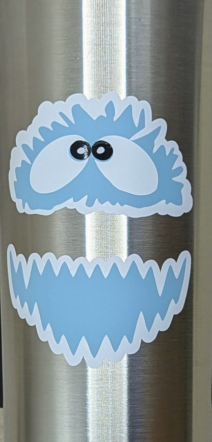 Yeti face vinyl decal applied to a stainless steel tumbler
