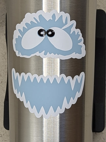 Close-up of the yeti face vinyl decal on a stainless tumbler